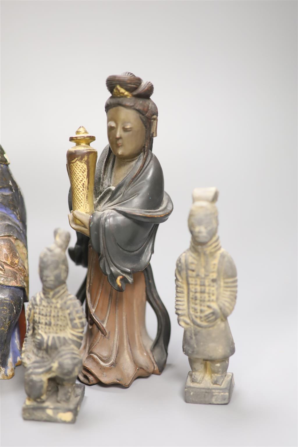 Five various Chinese pottery figures, a composite figure and a painted wood figure, tallest 20cm